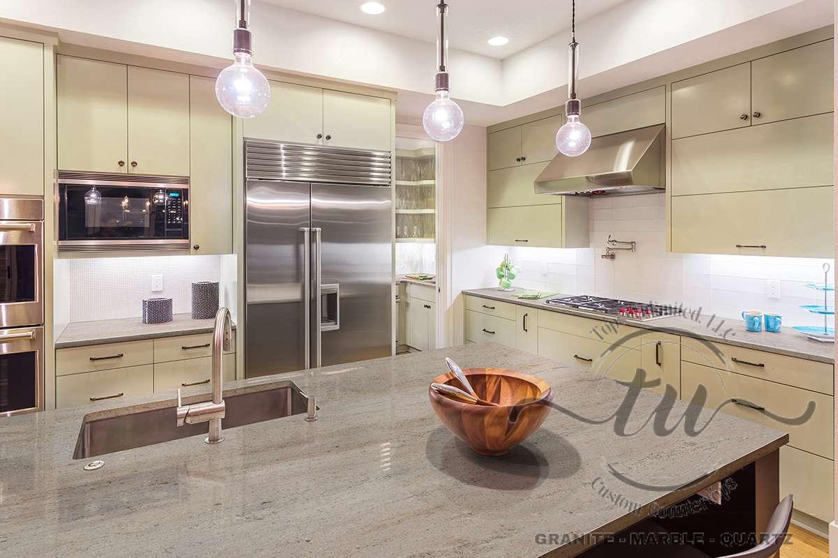 Beautiful Kitchen in Luxury Home with Island and Stainless Steel